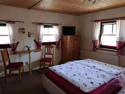 Ein Bett oder Betten in einem Zimmer der Unterkunft Elbhangzimmer Dresden