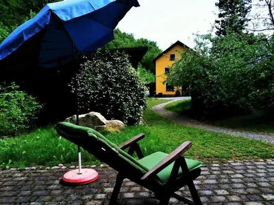 Ein Garten an der Unterkunft Die Holzschuhmühle