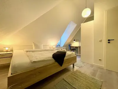 Ein Bett oder Betten in einem Zimmer der Unterkunft Apartment Zschachwitz in Dresden - ruhige Lage, modern, gute Anbindung!