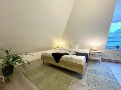 Ein Bett oder Betten in einem Zimmer der Unterkunft Apartment Zschachwitz in Dresden - ruhige Lage, modern, gute Anbindung!