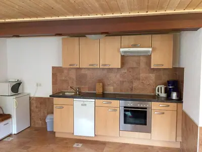 Küche/Küchenzeile in der Unterkunft Ferienwohnung Am Grünbach 2
