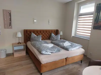 Ein Bett oder Betten in einem Zimmer der Unterkunft Pension Reichel