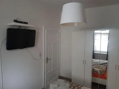 Ein Bett oder Betten in einem Zimmer der Unterkunft Max's Hinterhaus