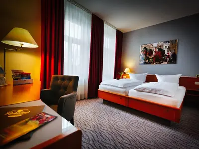 Ein Bett oder Betten in einem Zimmer der Unterkunft Hotel Kaiserhof