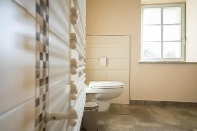 Ein Badezimmer in der Unterkunft Adlerhof