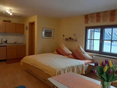 Ein Bett oder Betten in einem Zimmer der Unterkunft Ferienwohnungen Stephan