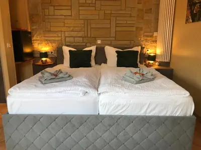 Ein Bett oder Betten in einem Zimmer der Unterkunft Pension 19
