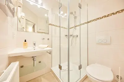 Ein Badezimmer in der Unterkunft Hotel garni Sonnenhof