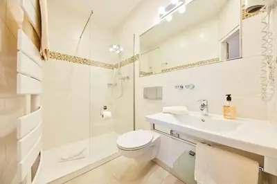 Ein Badezimmer in der Unterkunft Hotel garni Sonnenhof