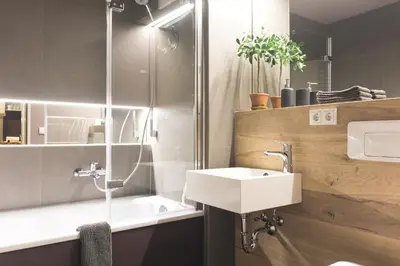 Ein Badezimmer in der Unterkunft KUKU Urban & Family Appartement