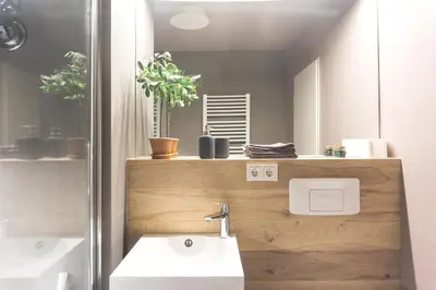 Ein Badezimmer in der Unterkunft KUKU Urban & Family Appartement
