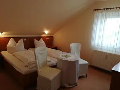 Ein Sitzbereich in der Unterkunft Weinbau & Pension 