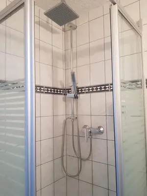 Ein Badezimmer in der Unterkunft Pension Krone