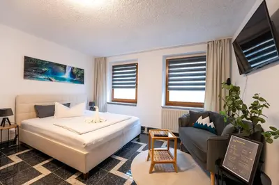 Ein Bett oder Betten in einem Zimmer der Unterkunft Pension Krone