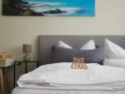 Ein Bett oder Betten in einem Zimmer der Unterkunft Pension Krone
