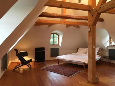 Ein Bett oder Betten in einem Zimmer der Unterkunft Dichterhaus Dresden