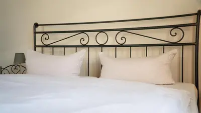 Ein Bett oder Betten in einem Zimmer der Unterkunft Albergo-Toscana