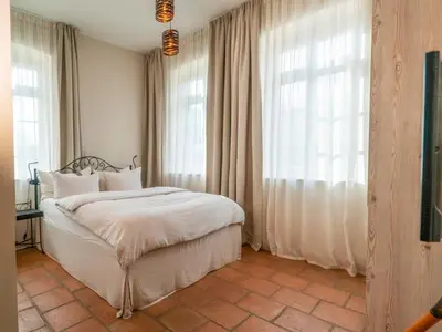 Ein Bett oder Betten in einem Zimmer der Unterkunft Albergo-Toscana
