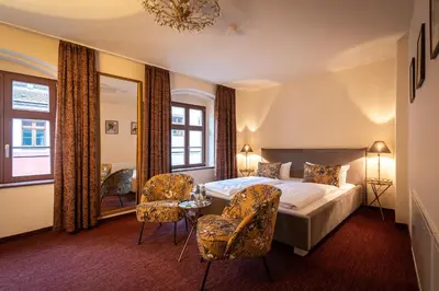 Ein Bett oder Betten in einem Zimmer der Unterkunft Pension Donatus