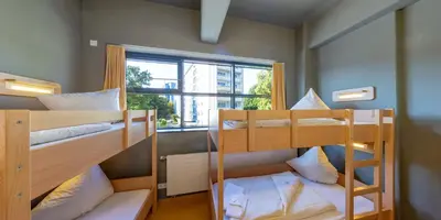 Ein Bett oder Betten in einem Zimmer der Unterkunft DJH Jugendherberge Chemnitz 