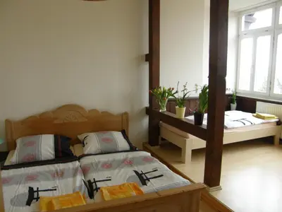 Ein Bett oder Betten in einem Zimmer der Unterkunft Villa Bellevue Dresden