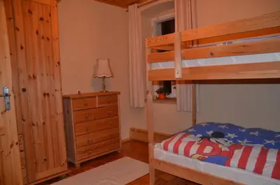 Ein Bett oder Betten in einem Zimmer der Unterkunft FEWO natuerlich-wolf