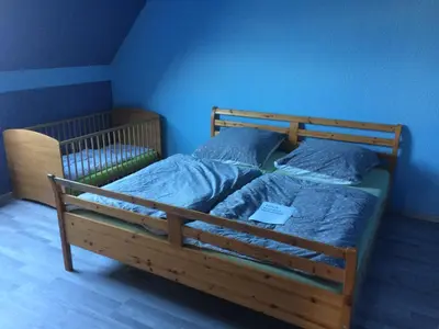 Ein Bett oder Betten in einem Zimmer der Unterkunft Haus Sonnenstein
