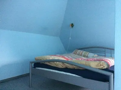Ein Bett oder Betten in einem Zimmer der Unterkunft Haus Sonnenstein