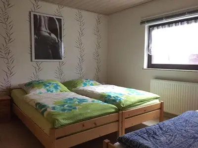 Ein Bett oder Betten in einem Zimmer der Unterkunft Ferienwohnung Schmidt 2