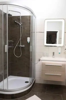 Ein Badezimmer in der Unterkunft Schlossgasthaus Lichtenwalde