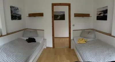 Ein Bett oder Betten in einem Zimmer der Unterkunft Waldhufenhaus in Schöna