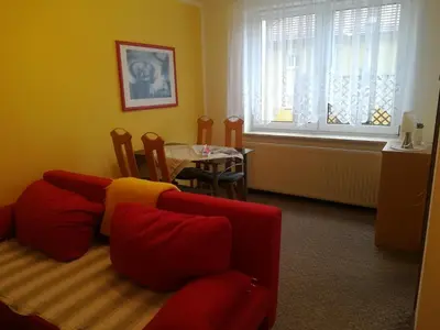 Ein Sitzbereich in der Unterkunft Ferienwohnung Schumann