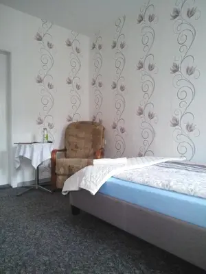 Ein Bett oder Betten in einem Zimmer der Unterkunft Landpension Haupt