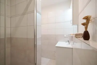 Ein Badezimmer in der Unterkunft Apartments am Schlosspark