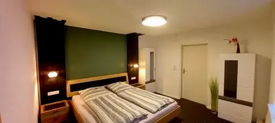 Ein Bett oder Betten in einem Zimmer der Unterkunft Ferienwohnung Stohn