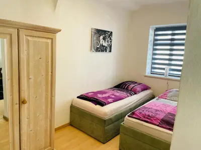 Ein Bett oder Betten in einem Zimmer der Unterkunft Ferienwohnung Stohn
