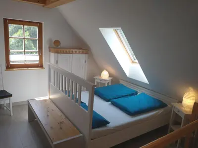 Ein Bett oder Betten in einem Zimmer der Unterkunft Ferienwohnung Brox