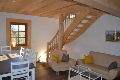 Ein Sitzbereich in der Unterkunft Ferienwohnung Brox