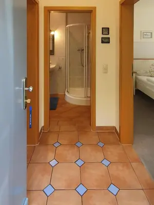 Ein Bett oder Betten in einem Zimmer der Unterkunft Ferienwohnung am Dresdner Elbhang
