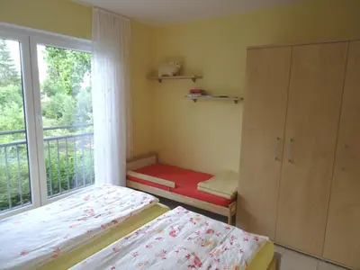 Ein Bett oder Betten in einem Zimmer der Unterkunft Ferienwohnungen Uhlemann - nur 15 Minuten bis in die Altstadt