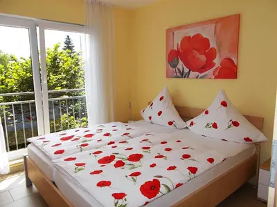 Ein Bett oder Betten in einem Zimmer der Unterkunft Ferienwohnungen Uhlemann - nur 15 Minuten bis in die Altstadt