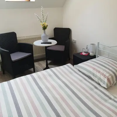Ein Bett oder Betten in einem Zimmer der Unterkunft Landhotel Sonnenschein