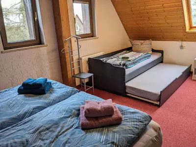 Ein Bett oder Betten in einem Zimmer der Unterkunft Ferienwohnung Dresden Nickern