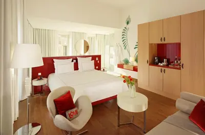 Ein Bett oder Betten in einem Zimmer der Unterkunft HYPERION Hotel Dresden Am Schloss