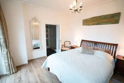 Ein Bett oder Betten in einem Zimmer der Unterkunft Villa Golding - Flat 1