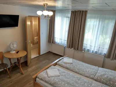 Ein Bett oder Betten in einem Zimmer der Unterkunft Gasthof Uttewalde