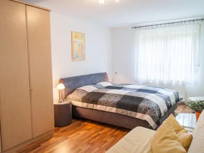 Ein Bett oder Betten in einem Zimmer der Unterkunft Ferienwohnung über den Dächern von Dresden