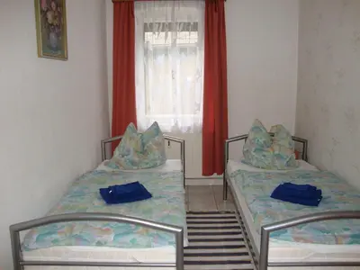 Ein Bett oder Betten in einem Zimmer der Unterkunft Ferienwohnung Dresden - Süd