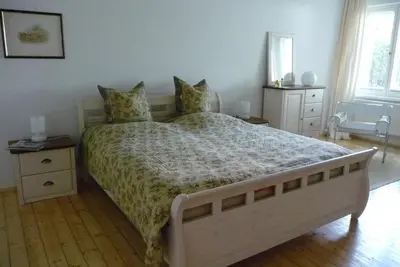 Ein Bett oder Betten in einem Zimmer der Unterkunft Quartier an der Elbe