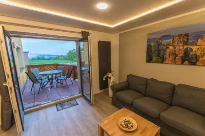 Ein Sitzbereich in der Unterkunft Ferienwohnung 